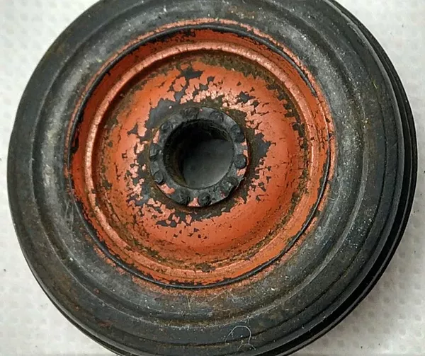 1-5/8" Original bakelite wheel.