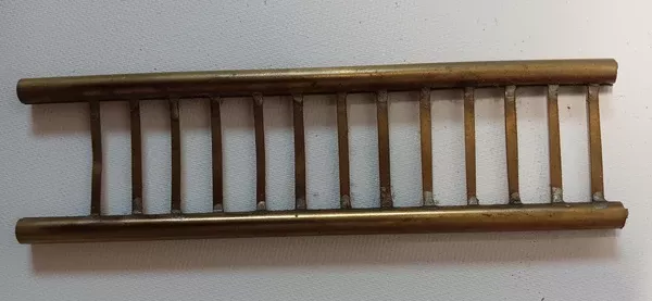 6-1/4" brass vintage toy ladder.1-3/4" wide.
