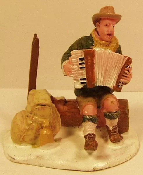 Camper playing accordian 2-1/4 in. train figures :